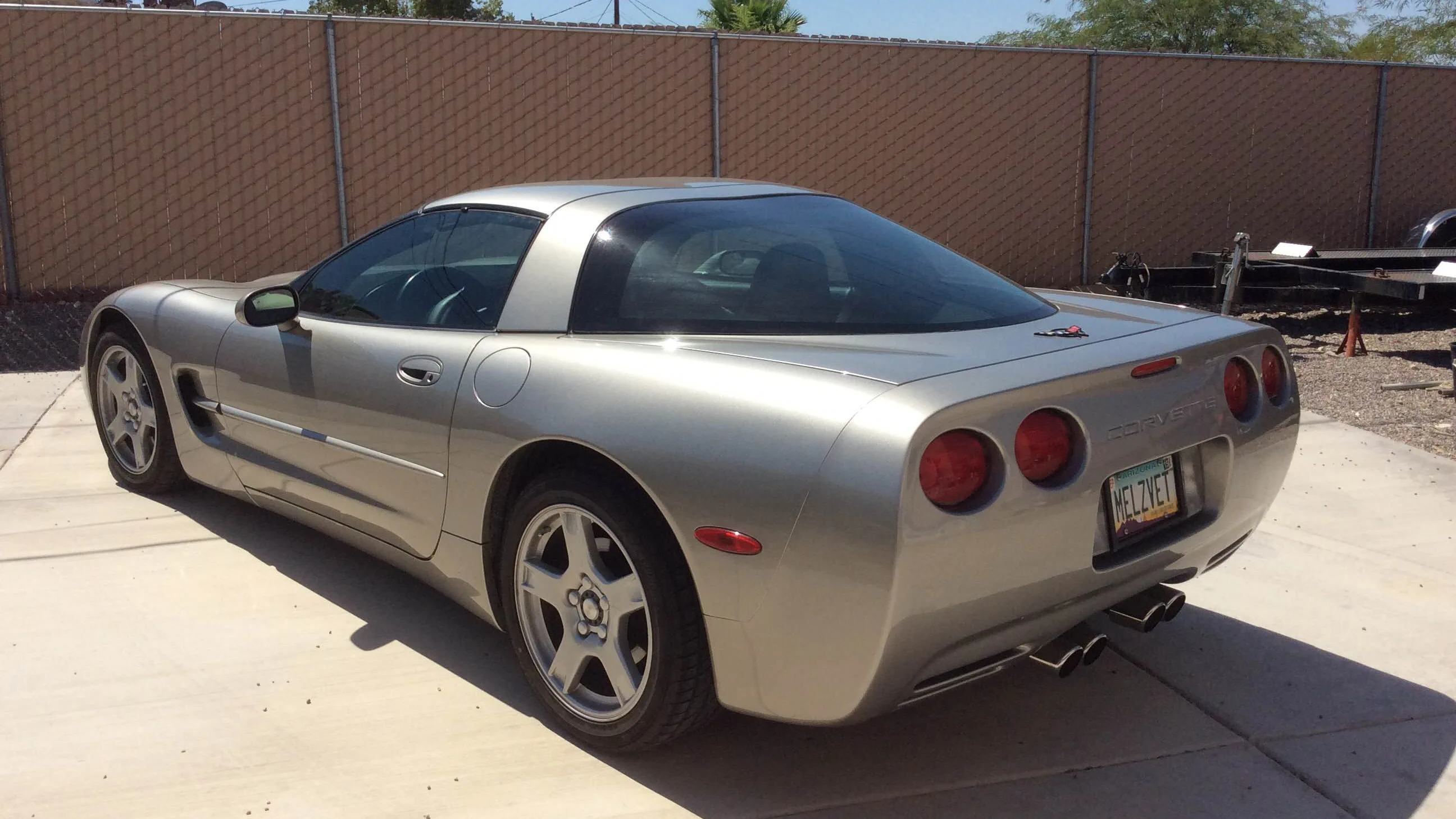 Click to Enlarge-Esc to Close Corvette Generations/C5/C5 1999 Silver rear 1.webp